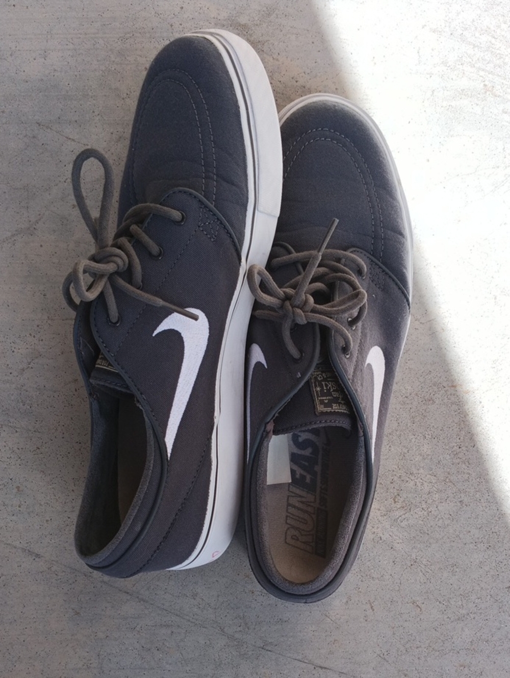 Nike Men’s Gray Canvas Sneakers with White Swoosh
